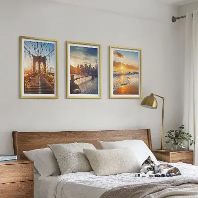 Wall art set featuring a bridge during a city sunset