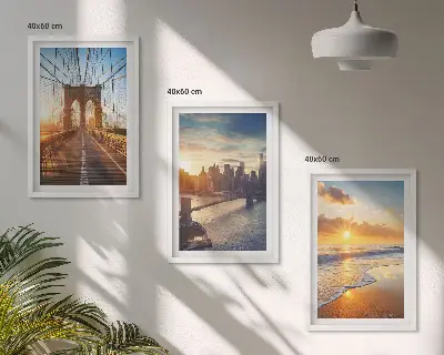 Wall art set featuring a bridge during a city sunset
