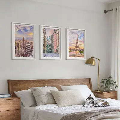 Wall art set featuring New York and Paris city twilight scenes
