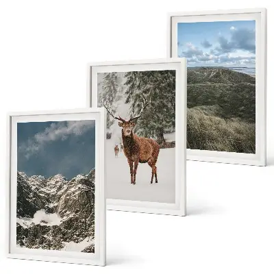 Set of 3 framed wall art pieces featuring a snowy mountain forest and deer landscape