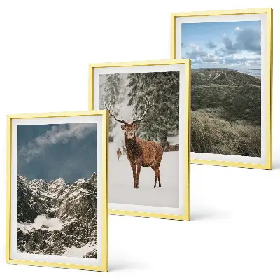 Set of 3 framed wall art pieces featuring a snowy mountain forest and deer landscape
