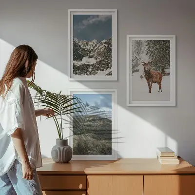 Set of 3 framed wall art pieces featuring a snowy mountain forest and deer landscape