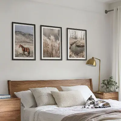 Wall art set featuring a landscape of horses in a grassy stream