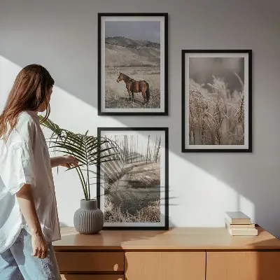 Wall art set featuring a landscape of horses in a grassy stream