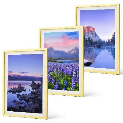 Three-piece mountain landscape wall art featuring water and sky scenery