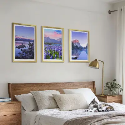 Three-piece mountain landscape wall art featuring water and sky scenery