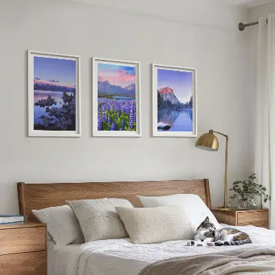 Three-piece mountain landscape wall art featuring water and sky scenery