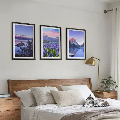 Three-piece mountain landscape wall art featuring water and sky scenery