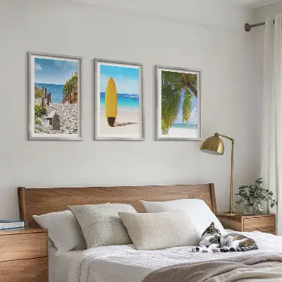Set of 3 framed wall art pieces featuring holiday beach waves and palm trees
