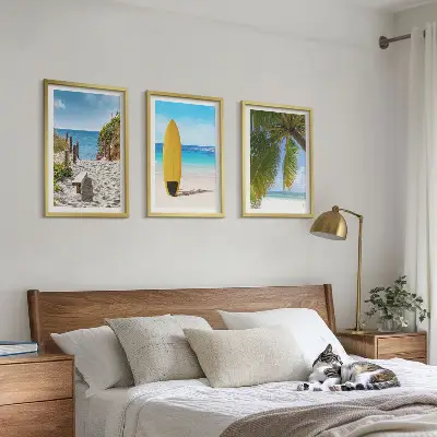 Set of 3 framed wall art pieces featuring holiday beach waves and palm trees