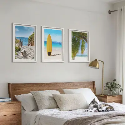 Set of 3 framed wall art pieces featuring holiday beach waves and palm trees