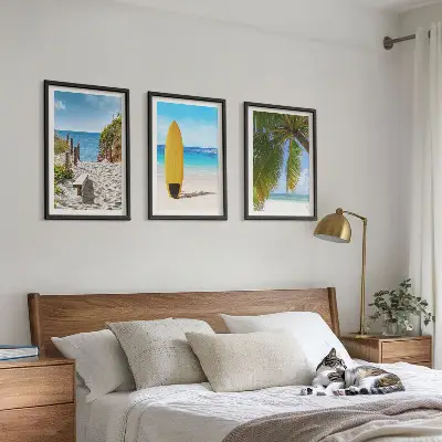 Set of 3 framed wall art pieces featuring holiday beach waves and palm trees