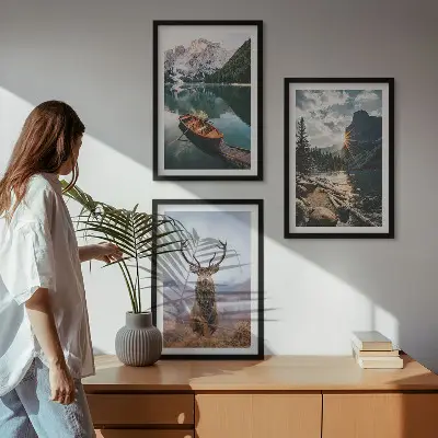 Three-piece wall art set featuring a mountain lake, boat, and deer at sunset