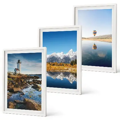 Nature-themed wall art set featuring views of a lighthouse, mountains, and a hot air balloon