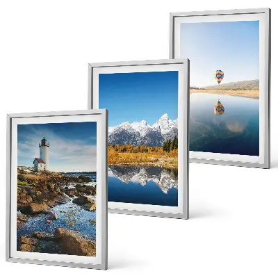 Nature-themed wall art set featuring views of a lighthouse, mountains, and a hot air balloon