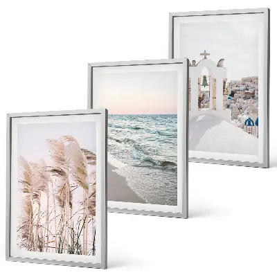 Three-piece wall art set featuring plants, sea waves, and coastal houses
