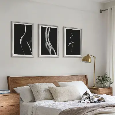 Three-piece wall art set featuring black and white female silhouettes
