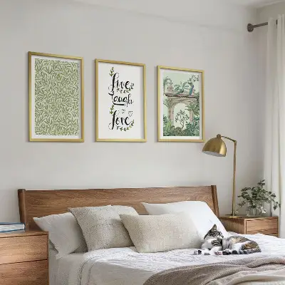 Set of 3 framed wall art pieces featuring green botanical leaf architecture