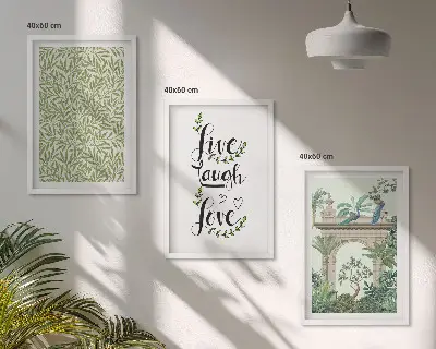 Set of 3 framed wall art pieces featuring green botanical leaf architecture