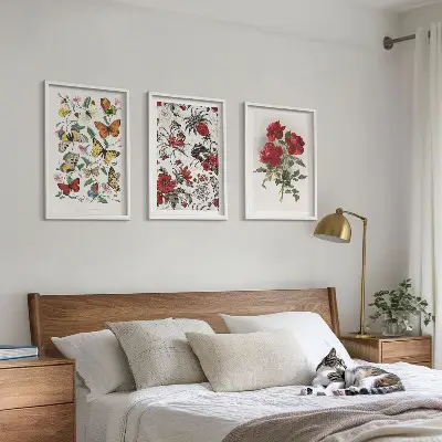 Set of 3 framed wall art pieces featuring butterflies and red roses