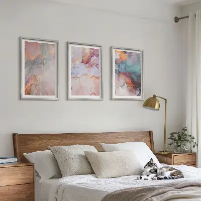 Set of 3 framed wall art pieces with abstract pastel patterns