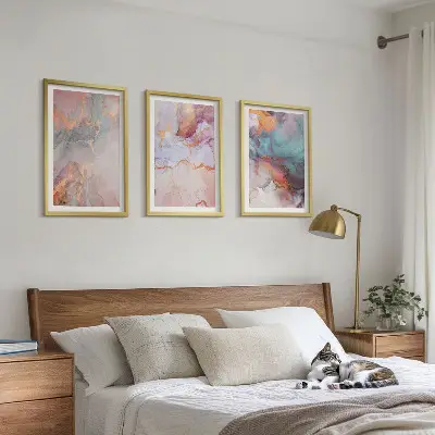 Set of 3 framed wall art pieces with abstract pastel patterns
