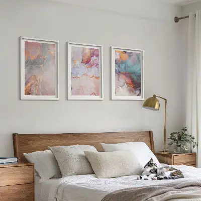 Set of 3 framed wall art pieces with abstract pastel patterns