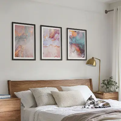 Set of 3 framed wall art pieces with abstract pastel patterns