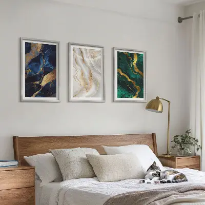Set of 3 framed wall art pieces with abstract blue and green patterns
