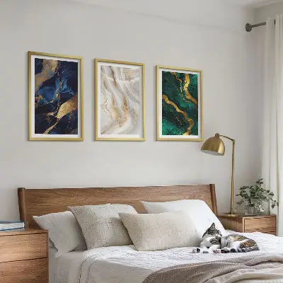 Set of 3 framed wall art pieces with abstract blue and green patterns