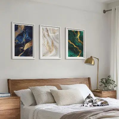 Set of 3 framed wall art pieces with abstract blue and green patterns