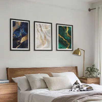 Set of 3 framed wall art pieces with abstract blue and green patterns