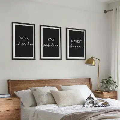 Three-piece wall art set with elegant motifs on black