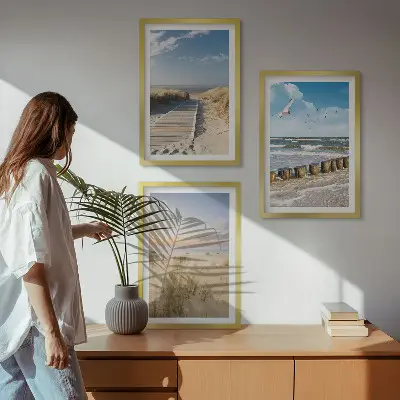 Wall art set featuring a coastal beach scene with sand, waves, sky, and birds