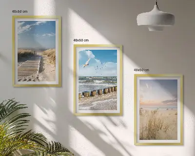 Wall art set featuring a coastal beach scene with sand, waves, sky, and birds