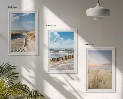 Wall art set featuring a coastal beach scene with sand, waves, sky, and birds