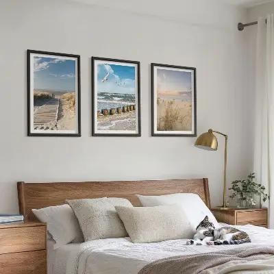 Wall art set featuring a coastal beach scene with sand, waves, sky, and birds
