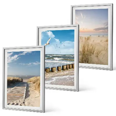 Wall art set featuring a coastal beach scene with sand, waves, sky, and birds