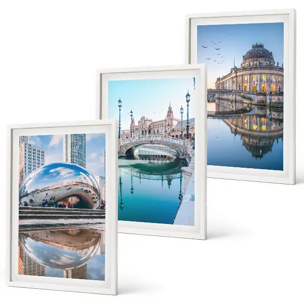 Set of 3 framed wall art pieces featuring architecture of cities on water