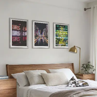 Set of 3 framed wall art pieces neon signs over a river at night