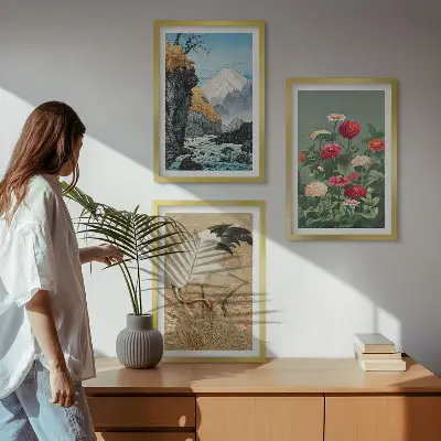 Set of 3 framed wall art pieces featuring a mountain landscape with a river, flowers, and cranes