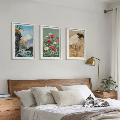 Set of 3 framed wall art pieces featuring a mountain landscape with a river, flowers, and cranes