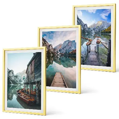 Three-piece wall art set featuring lake, mountains, and wooden boats
