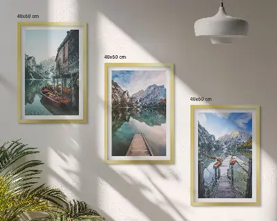 Three-piece wall art set featuring lake, mountains, and wooden boats