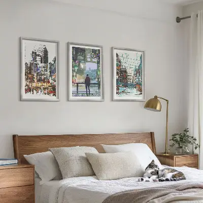 Set of 3 framed wall art pieces modern cities with colorful characters