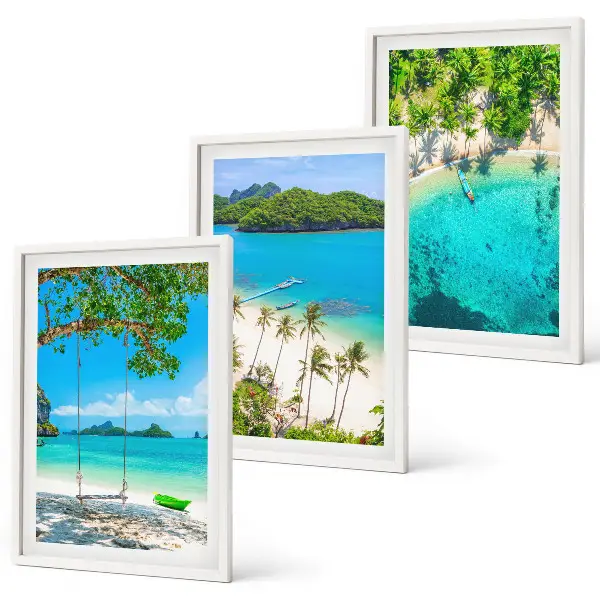 Set of 3 framed wall art pieces featuring beaches, palm trees, and clear water