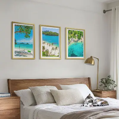 Set of 3 framed wall art pieces featuring beaches, palm trees, and clear water