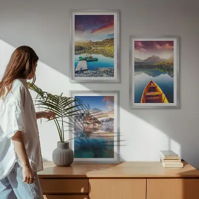 Three-piece wall art set featuring a landscape of lakes, mountains, and a boat
