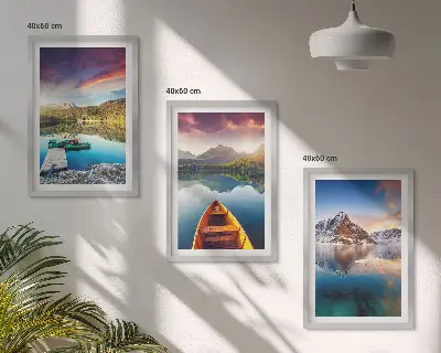 Three-piece wall art set featuring a landscape of lakes, mountains, and a boat