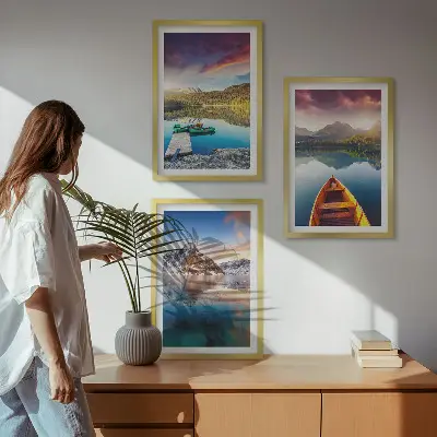 Three-piece wall art set featuring a landscape of lakes, mountains, and a boat